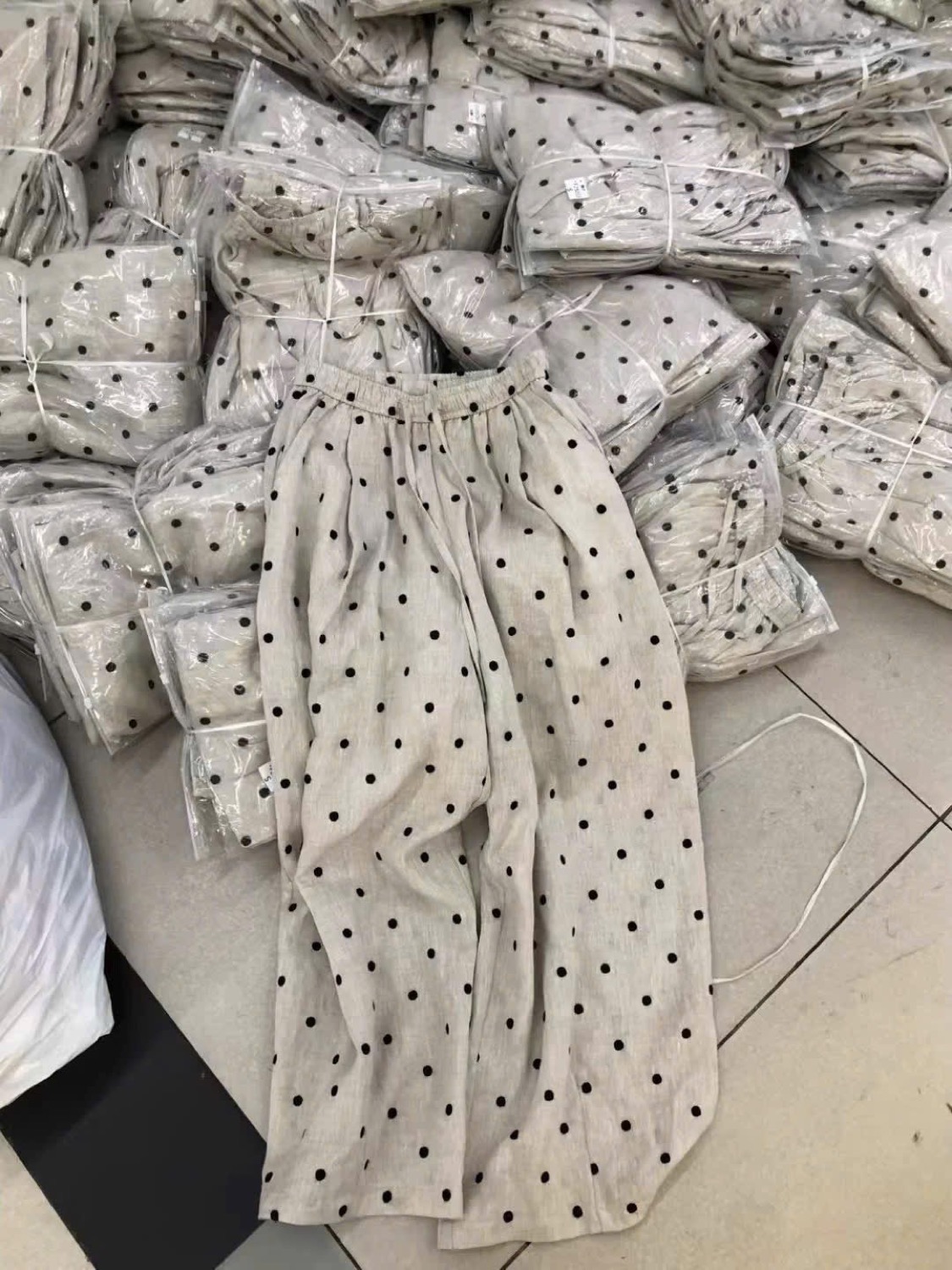 Đồ bộ chấm bi đóng gói theo lô
